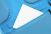 A close-up view inside a blue backpack, showing a white tablet or flat object placed in a mesh pocket. Produktbild-Vorschau