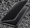 A black flip case for a Samsung Galaxy S9 phone is shown at an angle against a speckled black and white background. Náhled obrázku produktu