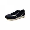 A single navy blue Tommy Hilfiger sneaker is shown against a white background. Náhled obrázku produktu