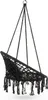 A black macrame hanging chair with fringe detail, suspended by ropes from a metal ring. Voir les images du produit