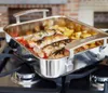 A roasting pan filled with food is placed on a stovetop. Produktbild-Vorschau