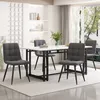 A dining table and chairs set in a modern dining room. Anteprima dell’immagine prodotto