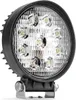 A close-up studio shot of a round LED work light with a black housing and a silver bracket. Anteprima dell’immagine prodotto