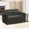 A dark gray sofa is shown in a living room setting with a fireplace and a lamp. Anteprima dell’immagine prodotto