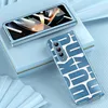 A folded smartphone and its case are displayed on a light blue surface. Produktbild-Vorschau