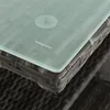 Close-up of the corner of a polyrattan table with a tempered glass top. Produktbild-Vorschau