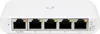 A white Ubiquiti UniFi Switch USW-Flex-Mini is shown on a white background, with its ports and indicator lights clearly visible. Voir les images du produit