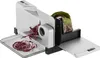 A food slicer with radicchio being sliced. Produktbild-Vorschau