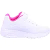 A white sneaker with pink accents is shown against a white background. Voir les images du produit