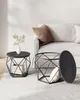 Two black geometric coffee tables and a couch in a living room. Náhled obrázku produktu