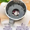 A close-up view of a food processor attachment with chopped red onions inside, highlighting its function. Produktbild-Vorschau
