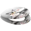 A toilet seat with a butterfly and flower design. Náhľad obrázku produktu