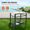 A black outdoor grill cart with a glass top, placed on a grassy area next to a swimming pool. Produktbild-Vorschau