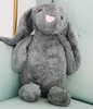 A plush bunny toy sitting on a chair. Anteprima dell’immagine prodotto