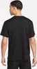 A person wearing a black t-shirt. Podgląd zdjęcia produktu
