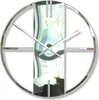 A modern, silver wall clock with a unique, abstract design. Náhled obrázku produktu