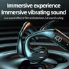 Close-up of black wireless headphones with a digital display showing '100', set against a dark, rippling background. Produktbild-Vorschau