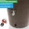 A close-up of a brown textured barrel with a silver faucet attached. Accessories like a roll of white and red tape and two black rings are placed in the foreground. Produktbild-Vorschau