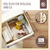 A storage box filled with children's toys, with dimensions and capacity indicated. Voir les images du produit