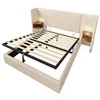 A beige upholstered bed frame with a slatted mattress support system, featuring integrated bedside tables with lights and wooden accents. Produktbild-Vorschau