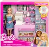A Barbie coffee shop playset in its packaging, featuring a Barbie doll and various accessories. Produktbild-Vorschau