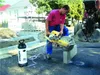 A man is using a concrete saw with a water supply system on a construction site. Náhľad obrázku produktu
