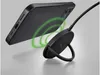 A black smartphone is shown wirelessly charging on a black magnetic charging pad with a ring stand. Produktbild-Vorschau