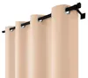 A close-up view of beige curtains hanging on a black curtain rod. Produktbild-Vorschau