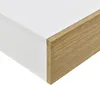 A close-up view of the corner of a white shelf with a wood-colored drawer front. Náhľad obrázku produktu
