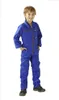 A young boy is standing and posing for a product photo, wearing a blue jumpsuit. Produktbild-Vorschau