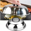 A hand is holding a stainless steel dome lid over cheeseburgers on a grill. Another dome lid is shown below. Voir les images du produit