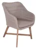 A single wicker armchair with a cushion on a white background. Produktbild-Vorschau
