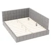 A grey upholstered bed frame with a slatted base, shown from a diagonal angle. Produktbild-Vorschau