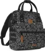 A black backpack with a white abstract pattern and brown leather accents. Produktbild-Vorschau