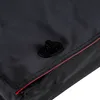 A close-up of a black bag with a red trim and a black clasp. Náhľad obrázku produktu