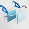 A close-up view of a blue and white clothes drying rack attached to a white surface, with two blue towels hanging on it. Arrows indicate movement. Produktbild-Vorschau