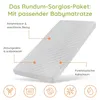 A white baby mattress with descriptive text and icons highlighting its features. Produktbild-Vorschau