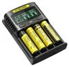 A Nitecore UM4 battery charger with four 18650 batteries inserted. Náhled obrázku produktu