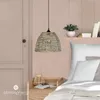 A bedroom scene with a pendant lamp and bedside table. Náhled obrázku produktu