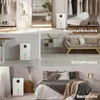 Collage of three scenes showing a white dehumidifier in different room settings: a closet/dressing room, a living room/study, and a bedroom. Produktbild-Vorschau