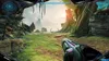First-person perspective of a video game environment with a futuristic weapon in the foreground. Produktbild-Vorschau