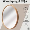 A round mirror with a wooden frame, presented with descriptive text and icons highlighting its features. Anteprima dell’immagine prodotto