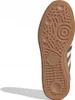 The sole of a brown Adidas Handball Spezial shoe is shown against a white background. Voir les images du produit