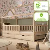 A child's bedroom with a wooden house bed and toys. Produktbild-Vorschau