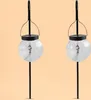 Two solar-powered hanging globe lights on stakes against a plain background. Produktbild-Vorschau