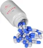 A white bottle of Neo Cap Bacter capsules is tipped over, spilling blue and white capsules onto a white surface. Produktbild-Vorschau