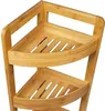 A close-up view of a multi-tiered corner shelf made of bamboo. Podgląd zdjęcia produktu