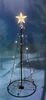 A decorative LED Christmas tree with a star on top, set against a snowy, blurred background. Produktbild-Vorschau