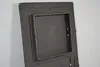 A close-up of a cast iron door for a stove or oven. Anteprima dell’immagine prodotto