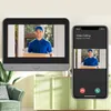 A digital peephole viewer and a smartphone displaying a video call. Náhľad obrázku produktu